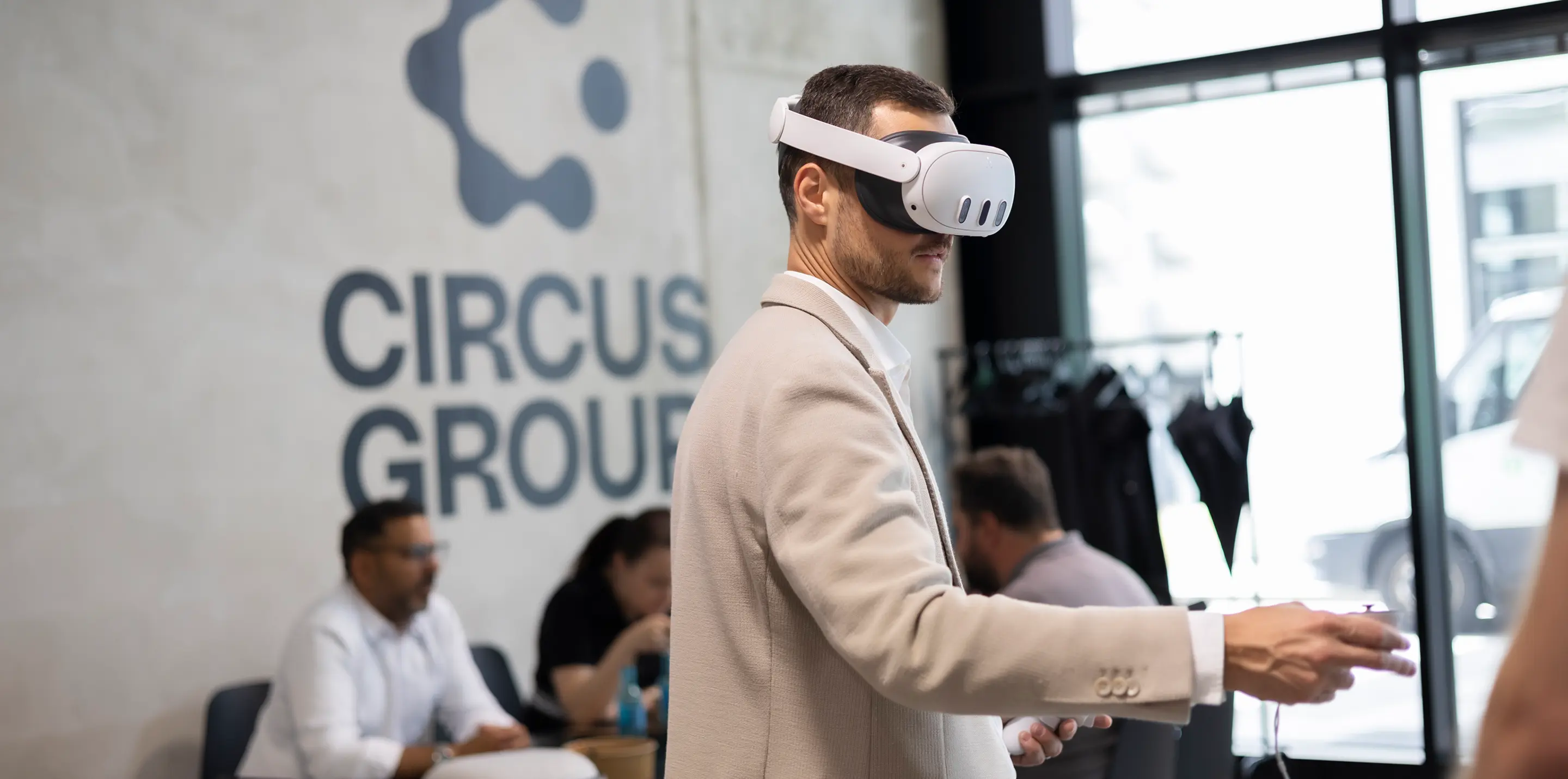 Person in a VR headset placing a CA-1 unit in their space